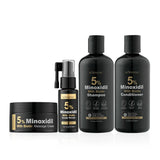 Kormesic 5% Minoxidil with Biotin Hair Care Set in luxury dark gift box. Displays 5 percent Minoxidil shampoo 300ml, conditioner 300ml, scalp massage cream 100g, and targeted scalp spray serum 30ml with barcode 6942581730102. Available online in Pakistan at Harram Store.