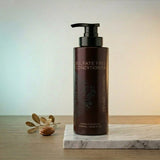 Keratin Complex Sulfate Free Argan Oil Conditioner 1000ml bottle. Professional white and gold packaging highlighting a Paraben-Free formula with No Artificial Preservatives. Ideal for deep hydration and maintaining keratin-treated hair, available at Harram Store. Barcode: 6943216506222