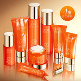 ETAE Vitamin C Niacinamide Moisturizing Renewal 8-piece skincare gift set in premium orange and white packaging. The set includes Cleansing Milk, Essence Water, Firming Essence, Burning Essence, Moisturizing Cream, Tone-Up Cream, Eye Cream, and a Sleeping Mask for a complete glass-skin routine. Barcode: 6942017805336. 100% authentic professional facial kit available at Harram Store