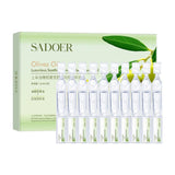 SADOER Olive Oil Luxurious Soothing Single Use Essence Oil 10-piece ampoule box set as seen in 'Sadeor Olive Oil Box.jpeg.jpg'. The premium green and gold individual 1.5ml capsules highlight a concentrated formula designed to fade wrinkles and intensely moisturize dry skin, available at Harram Store. Barcode: 6926923601718