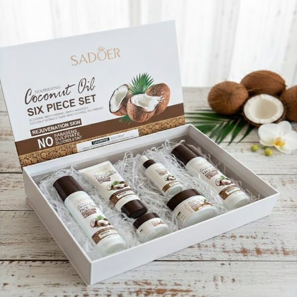 Sadoer Nourishing Coconut Oil Six Piece Set skincare bundle, open white gift box packaging showing all six products: Face Toner, Cleanser, Serum, Face Cream, Eye Cream, and Face Lotion. Focus on deep hydration and smooth, fluffy skin. Barcode: 6942349745072