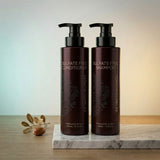 Keratin Complex Sulfate-Free Argan Oil Shampoo and Conditioner 400ml bundle. Professional white and gold packaging featuring a clean formula with No Artificial Preservatives and Zero Parabens. The ultimate duo for deep hydration and maintenance of treated hair, available at Harram Store.